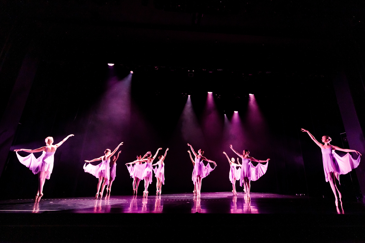 Dancers stand on pointe while performing "Facade," choreographed by faculty member Michelle Walter.