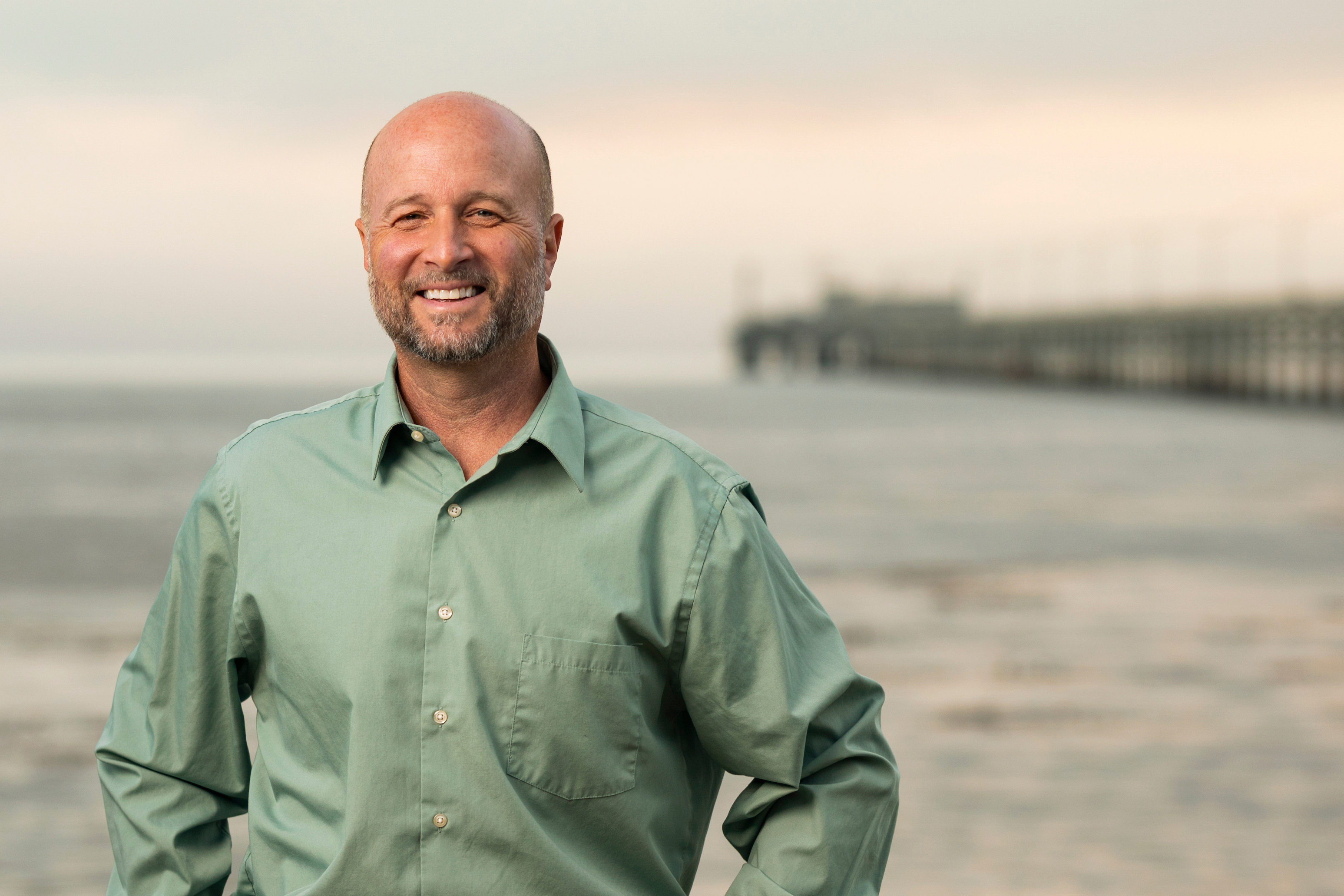 A professional headshot of Dean Wendt of the College of Science and Mathematics at the beach.