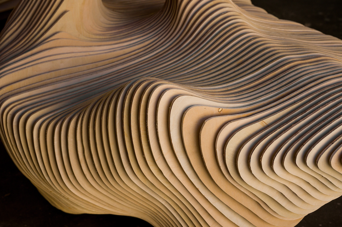 A detail shot of an innovative chair made from plywood sheets by students.