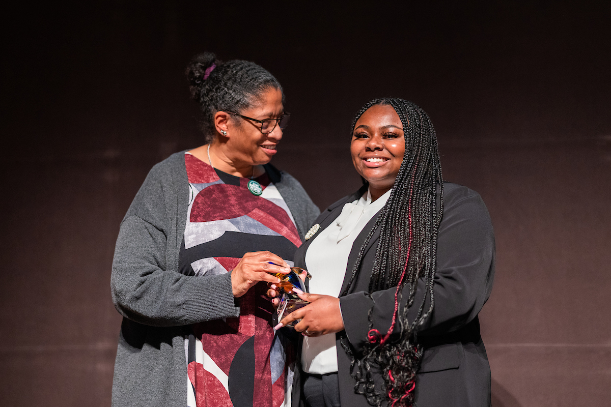 Professor Camille O'Bryant, left, and Nailah DuBose share the stage at the MLK Jr. Legacy Event.