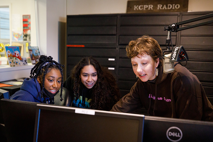 High school students visit KCPR, the university's radio station during their visit to Cal Poly for United by Excellence