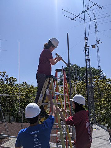 CPARC Members Hunter Herring-Alderete (KN6RJA), Ryan Jacoby (KN6REG), and Helen Zhang (KM6WJB) adding a new set of antennas to enable more communication with local amateur radio operators