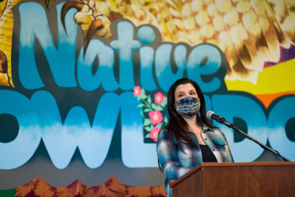 Associate Professor Jenell Navarro speaks at the Native American and Indigenous Cultural Center grand opening.