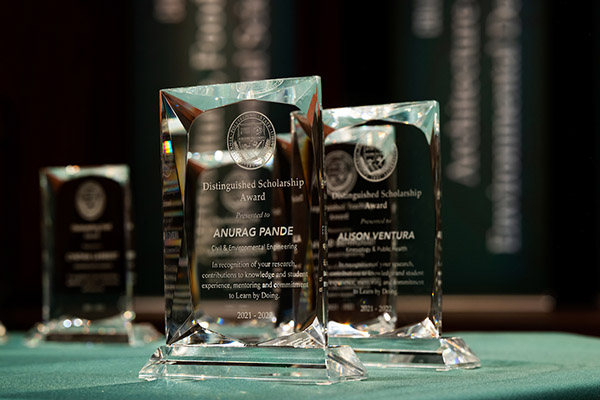 The Distinguished Scholarship Award sits among other awards at Fall Convocation.