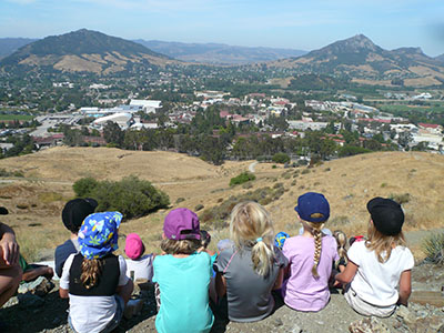 Children relax while on a hike in San Luis Obispo.