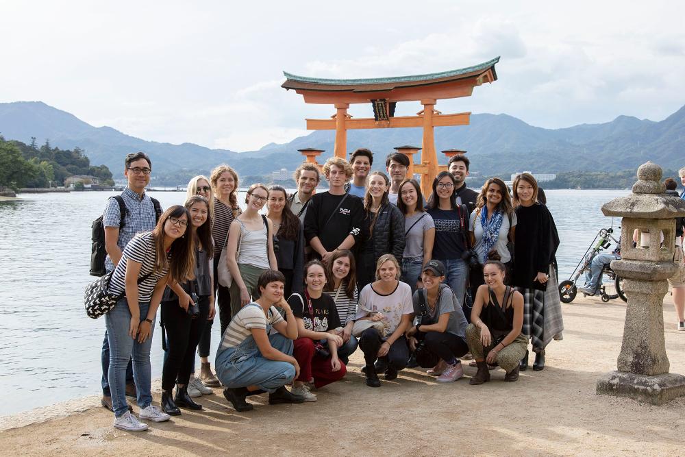 Students pictured in front of a lake in Japan.