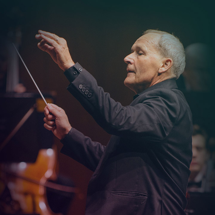 A conductor at a SLO Symphony performance