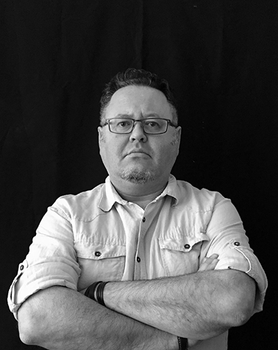 Black and white photo of architecture professor Umut Toker