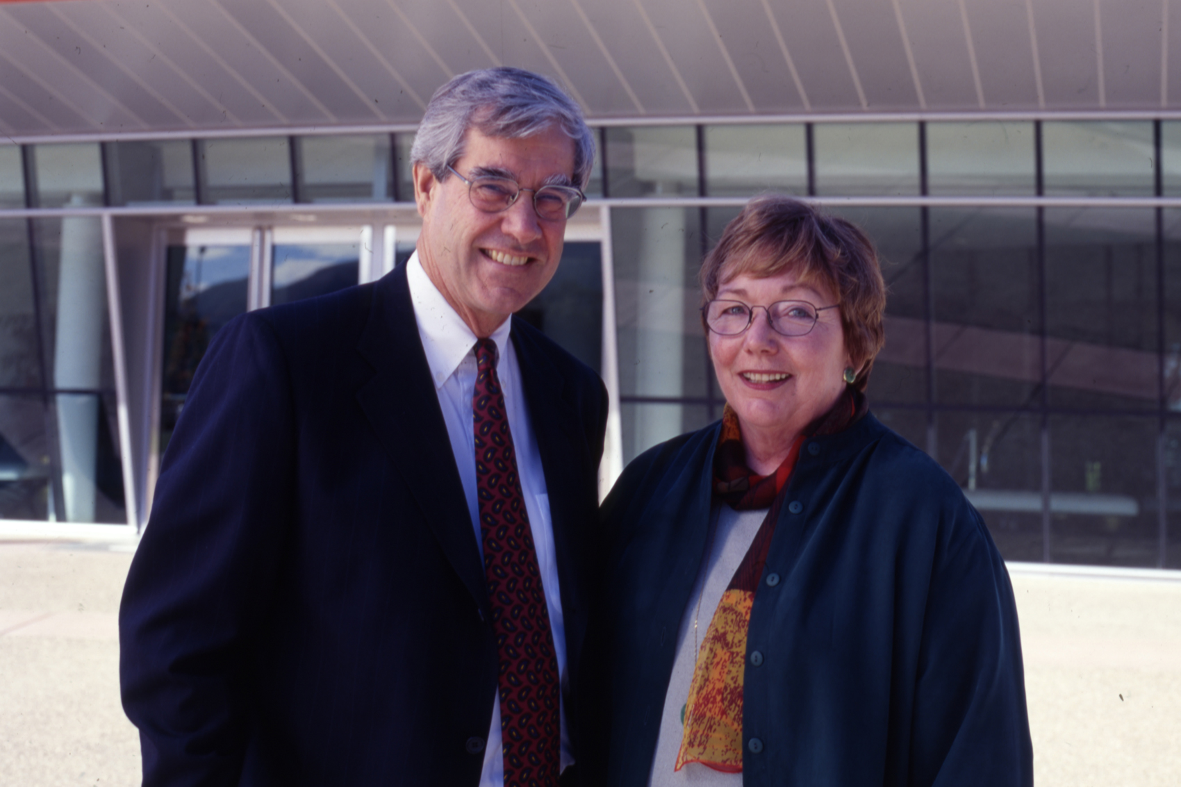 Warren and Carly Baker smile in front of the Performing Art Center
