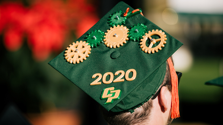 A green graduation cap with gears and Class of 2020