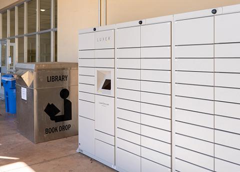 library lockers in front of the Dexter building where materials can be picked up