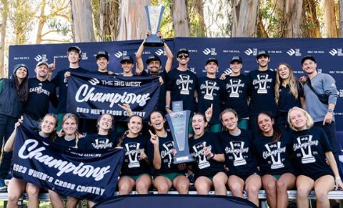 photo of the men and womens teams holding trophies and Big West title banners