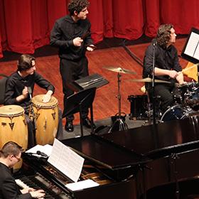 A Cal Poly jazz ensemble performs onstage at the PAC