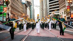 The Cal Poly Colorguard and and Mustang Band line up in downtown San Francsico at the start of the Chinese New Year Parade
