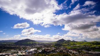 A panoramic image of the city of San Luis Obispo, with Cal Poly in the foreground.