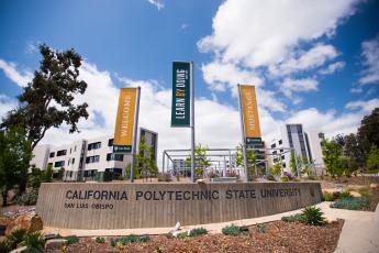 A shot of Cal Poly's entrance with flags.