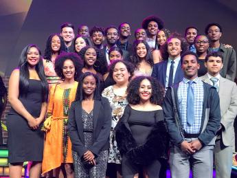 Members of Cal Poly’s chapter of the National Society of Black Engineers are pictured in formal attire. The photo was taken during the last in-person convention before the pandemic, so everyone is gathered close together.