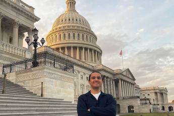 History student Ethan Gutterman, who was a Panetta Intern on Capitol Hill smiles for a photo in front of the U.S. Capitol Building