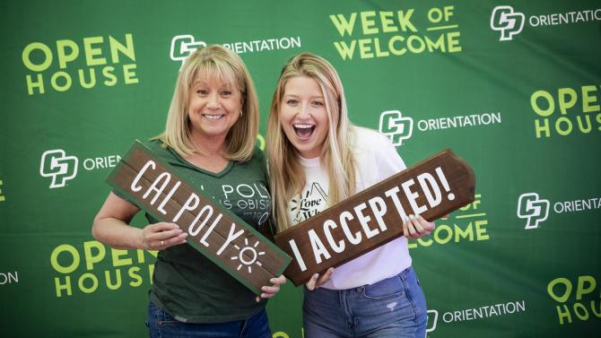 First-year student and parent celebrating acceptance