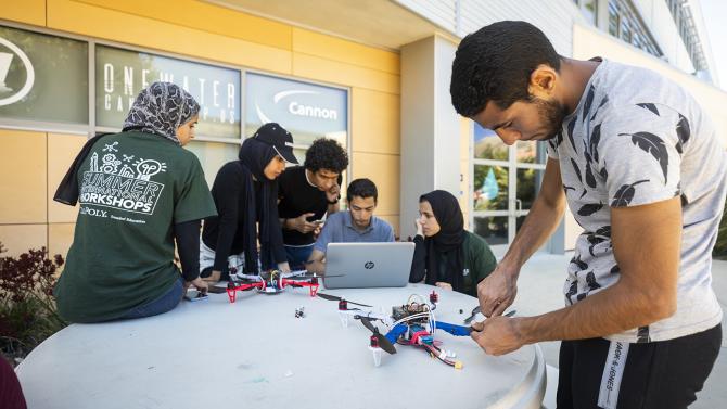 International students from Egypt work on robotics.