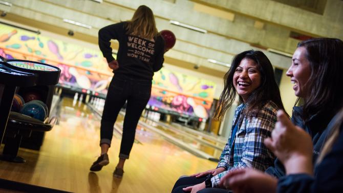 Students bowling at the on-campus bowling alley
