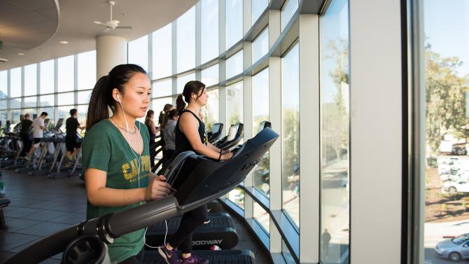 Students on a treadmill at the rec center