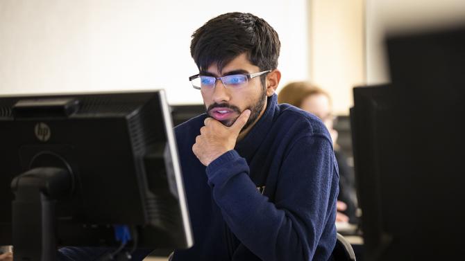 Student at a computer.
