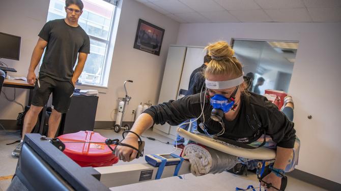 Kinesiology students work in the surf lab to help improve the methods of competitive surfers. 