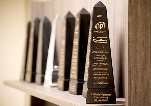 The 2021 award plus additional awards in the background.