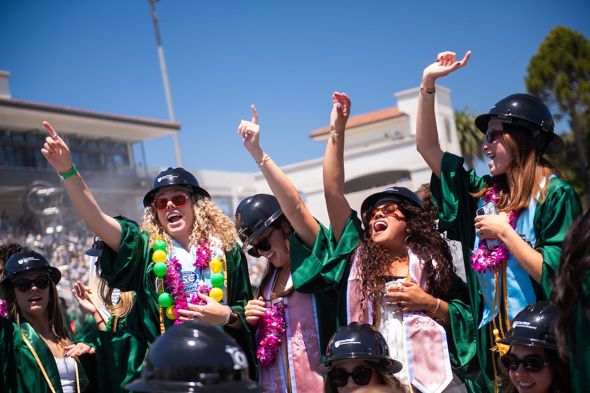 Graduates celebrate at commencement.