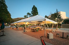 White pop-up tent set up on campus.