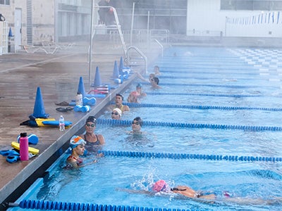 Swimmers in the pool at the Cal Poly Recreation Center.