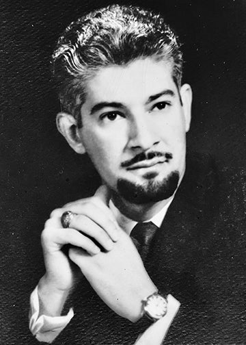 A black and white portrait of Sabah Al-Hadad as a young man