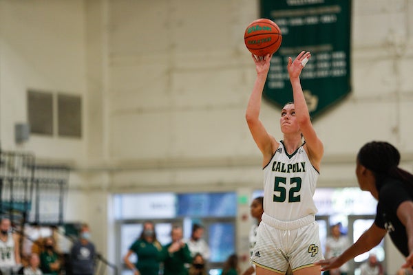 A basketball player shoots a free throw