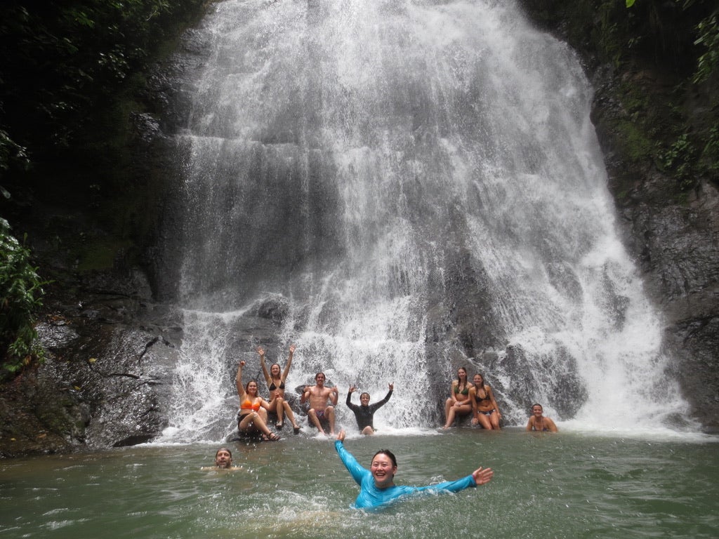 Students swimming in a river in Costa Rica.