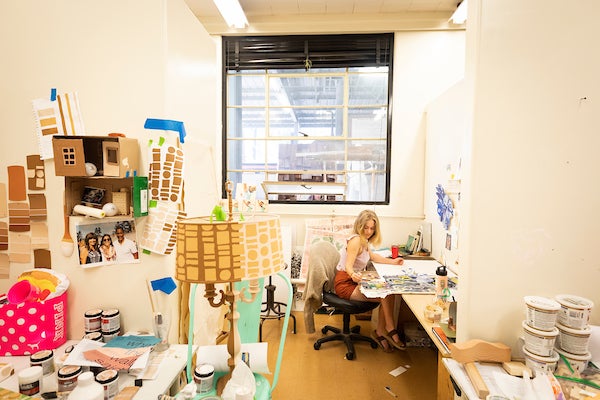 An artist working in a studio.