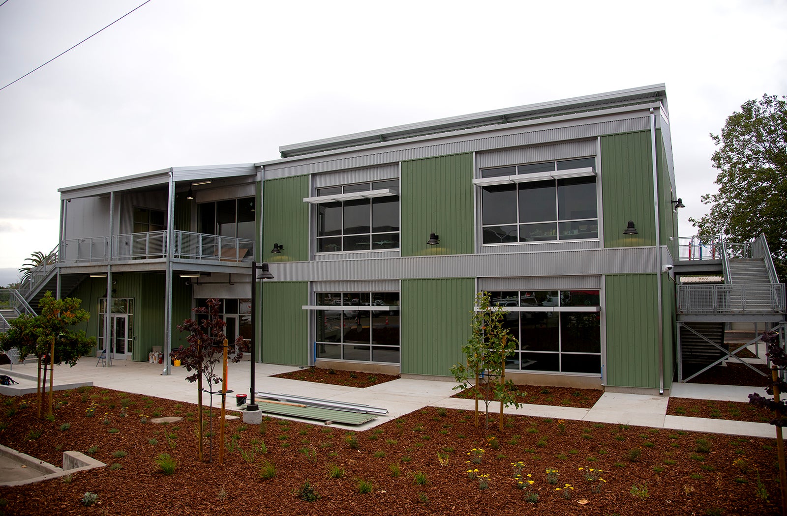 A building at the Cal Poly Tech Park with green siding.