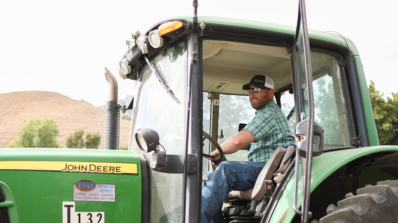 Student driving tractor 