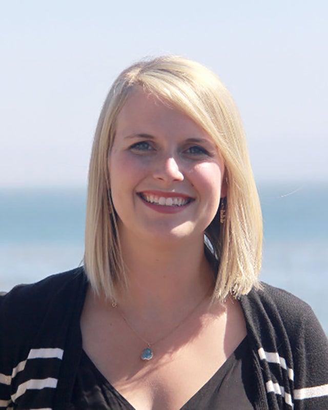 A headshot of Leslie Nelson.