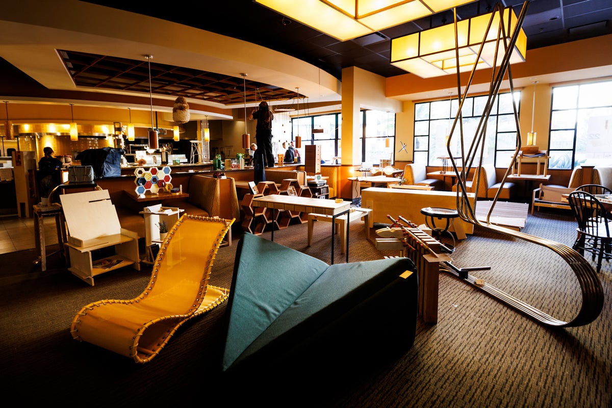 A collection of experimental furniture designs in an event space