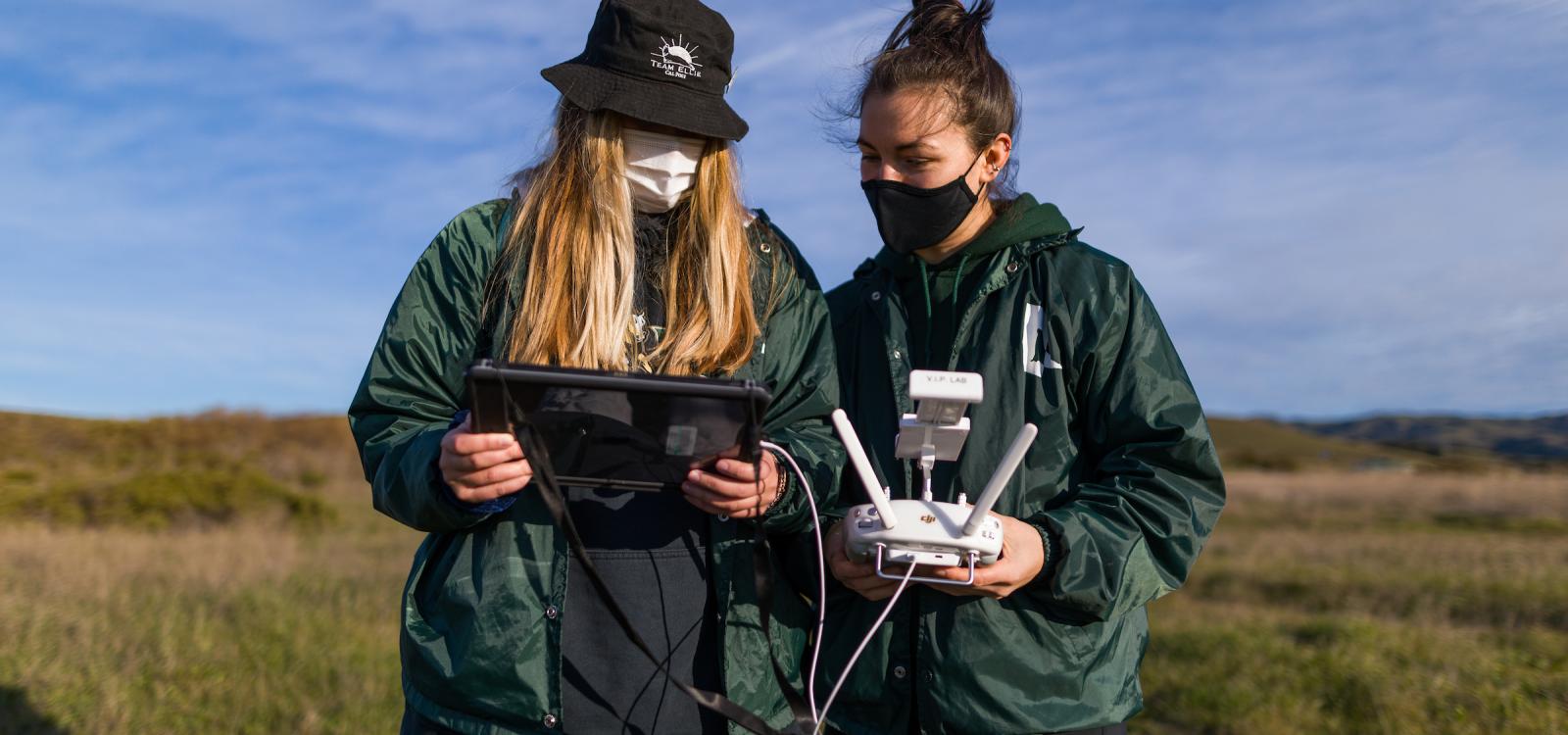 Graduate students Kate Riordan and Molly Murphy operate the aerial drone as it flies above the beach. NMFS permit #22187-02