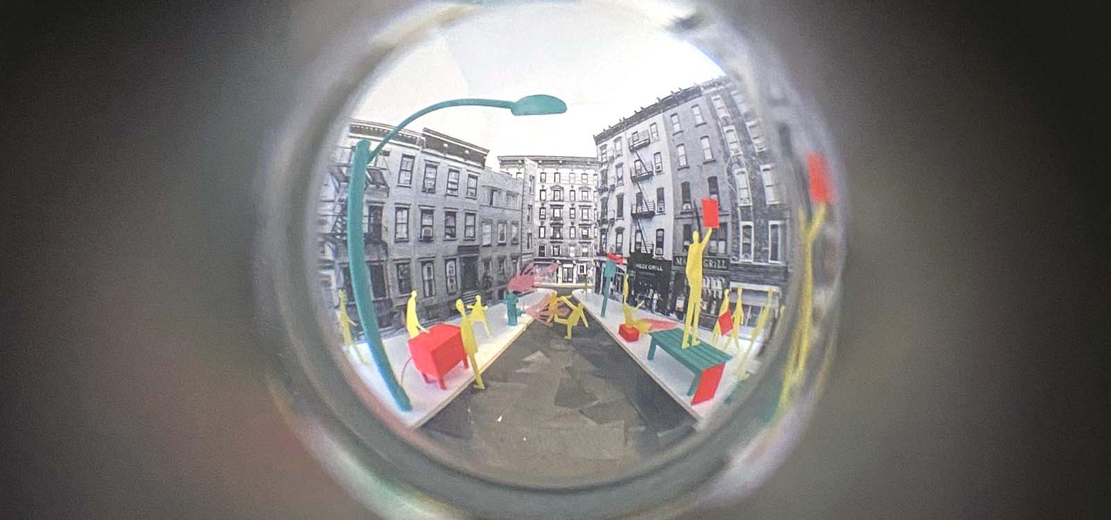 Interior diorama view of cityscape. 