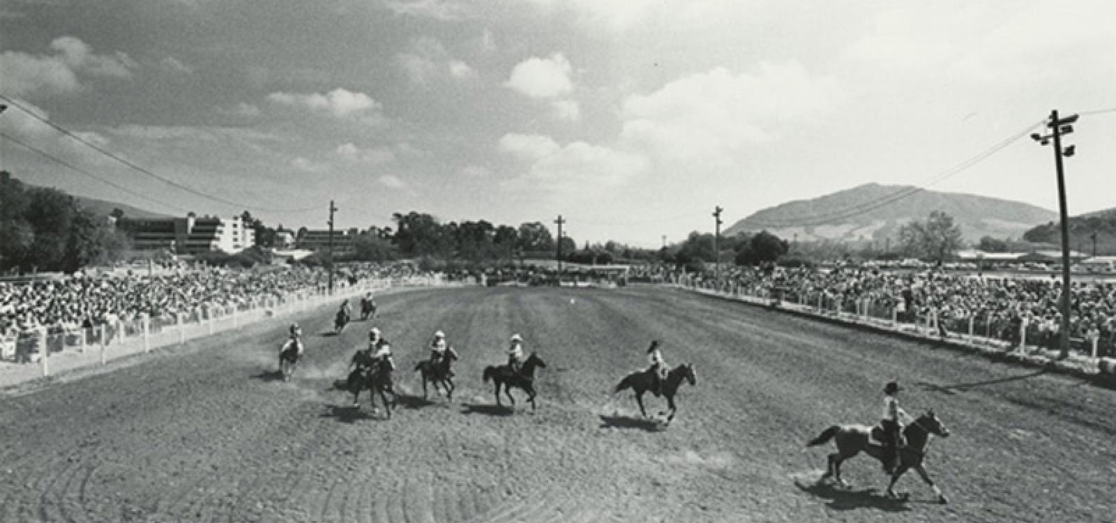 An archival image showing rodeo participants in an undated photo.