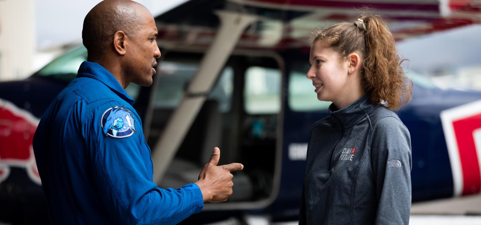 Glover talks with aerospace engineering student Claire Luce, who is part of the Project Mobius team at a San Luis Obispo Regional Airport hangar. 