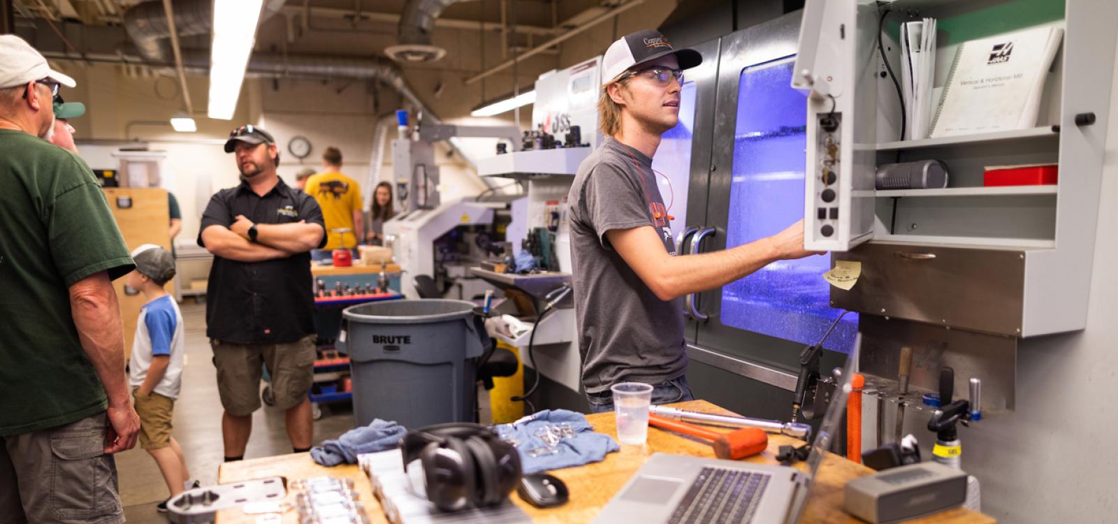 Inside the Mustang '60 Machine Shop, students showed visitors how they use mills, lathes and more
