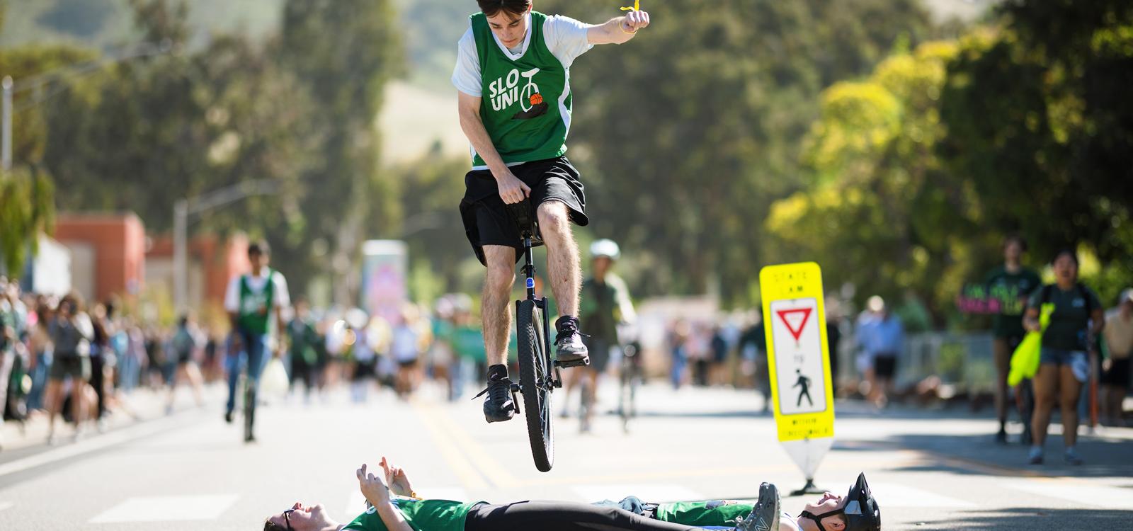 The Poly Royal Parade included a host of student performances, including a unicyclist performing a high-stakes stunt