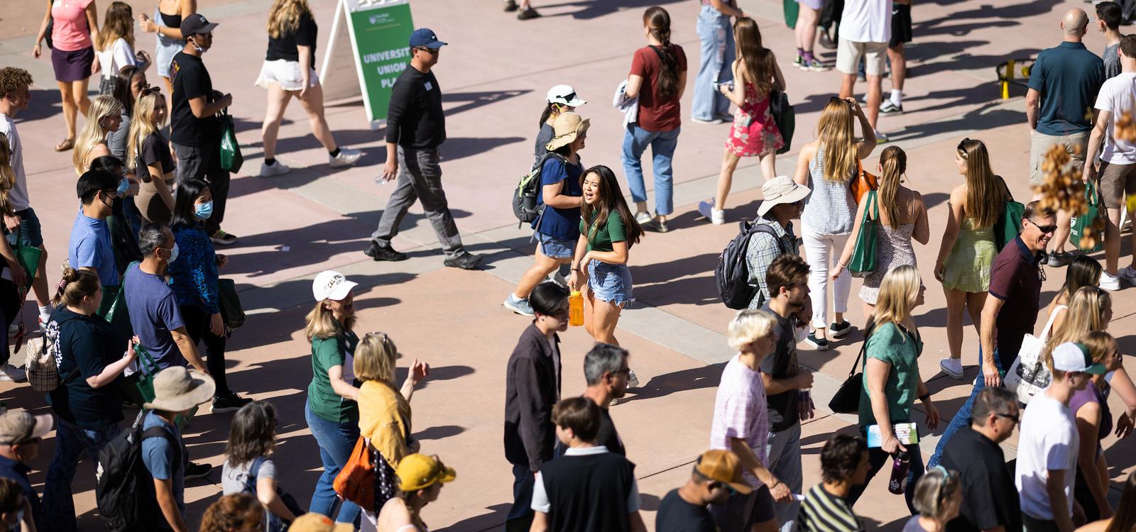 A Poly Rep leads one of many campus tours that took place during Open House weekend