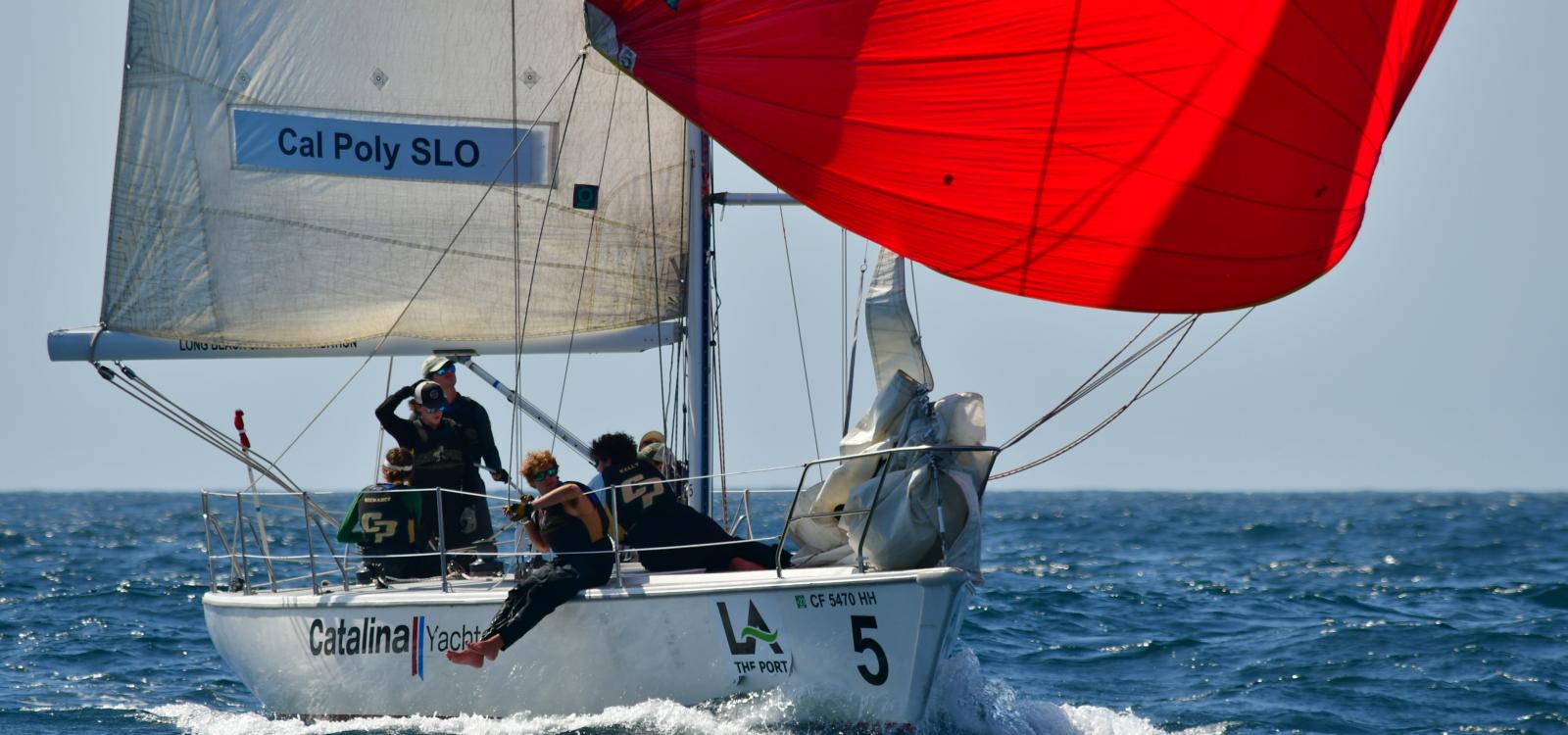 The Cal Poly Sailing Club on their boat during a race for the Los Angeles Harbor Cup. 