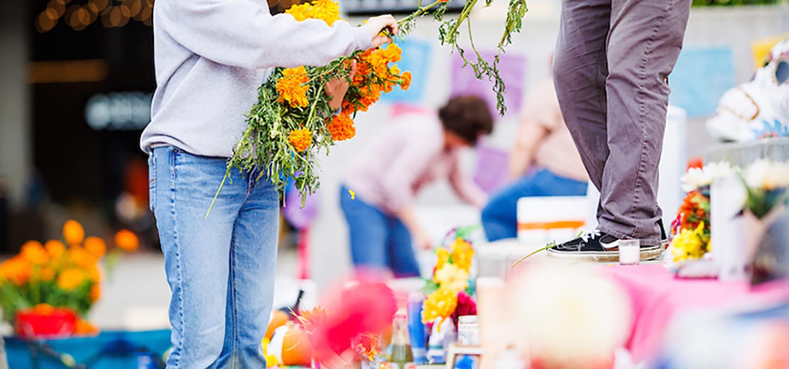 Students from a variety of campus cultural clubs worked together to set up the ofrendas and provide information to visitors throughout the day.