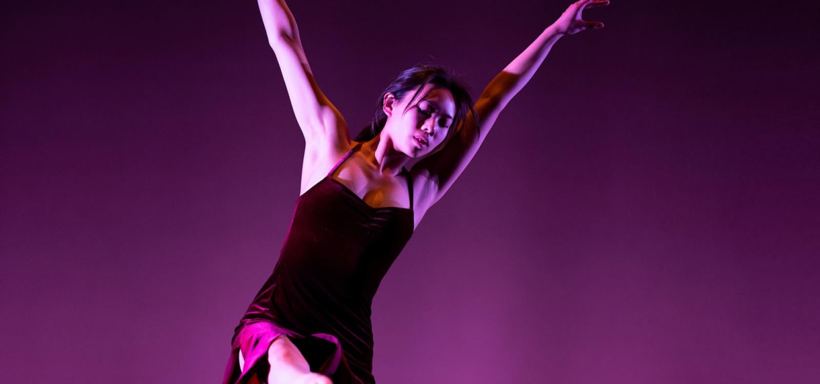 Student Joyce Lam dances in "Almost There" choreographed by guest artist Lisa Deyo.